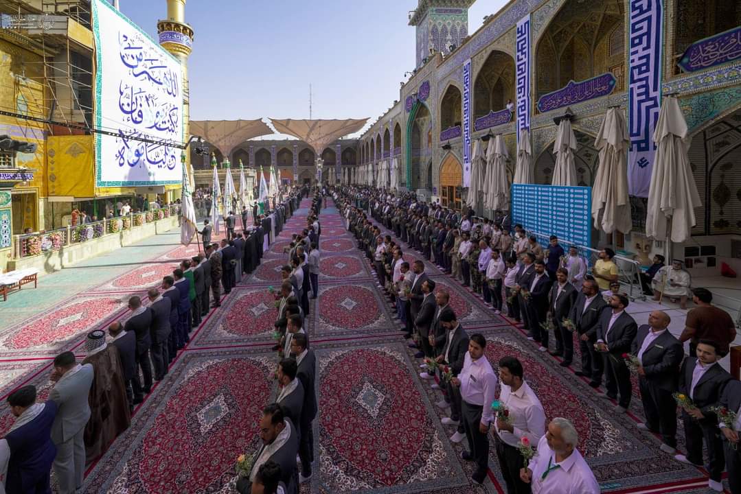 بالصور: رفع راية عيد الغدير في العتبة العلوية المقدسة بالنجف الأشرف