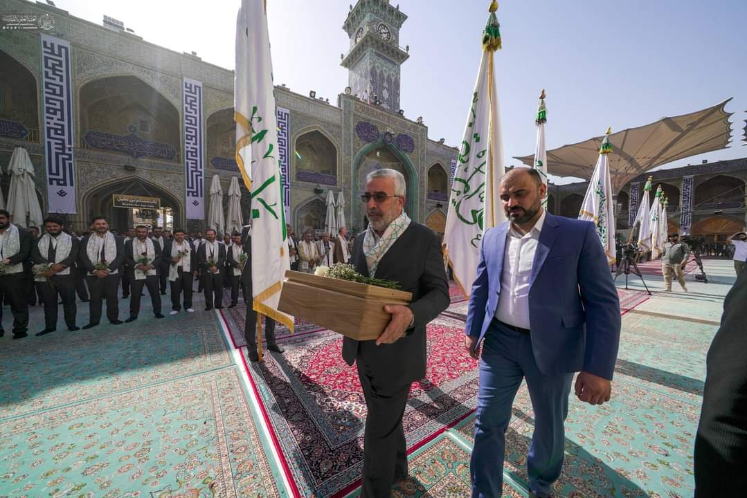 بالصور: رفع راية عيد الغدير في العتبة العلوية المقدسة بالنجف الأشرف