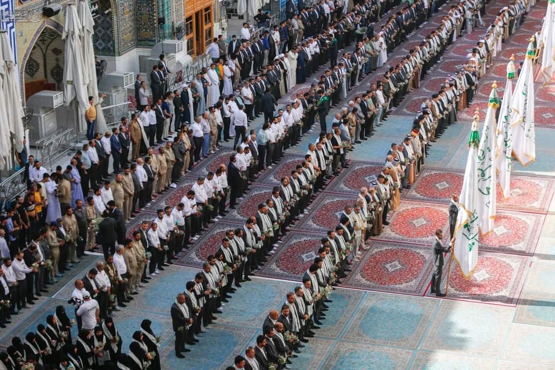 بالصور: رفع راية عيد الغدير في العتبة العلوية المقدسة بالنجف الأشرف